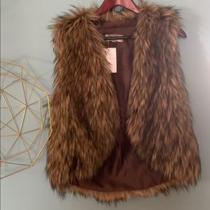 Faux fur vest. Size small. New with tags.